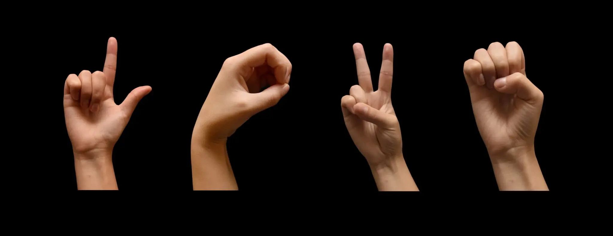 Four hands spelling LOVE in American Sign Language against a black background.