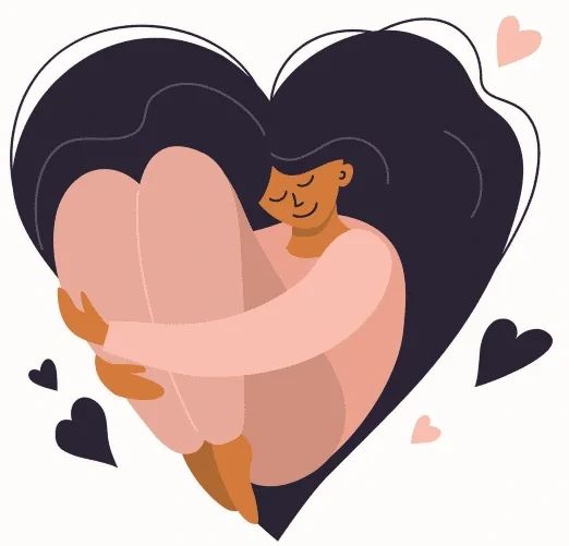 A person with long dark hair sits curled in a ball inside the shape of a heart.